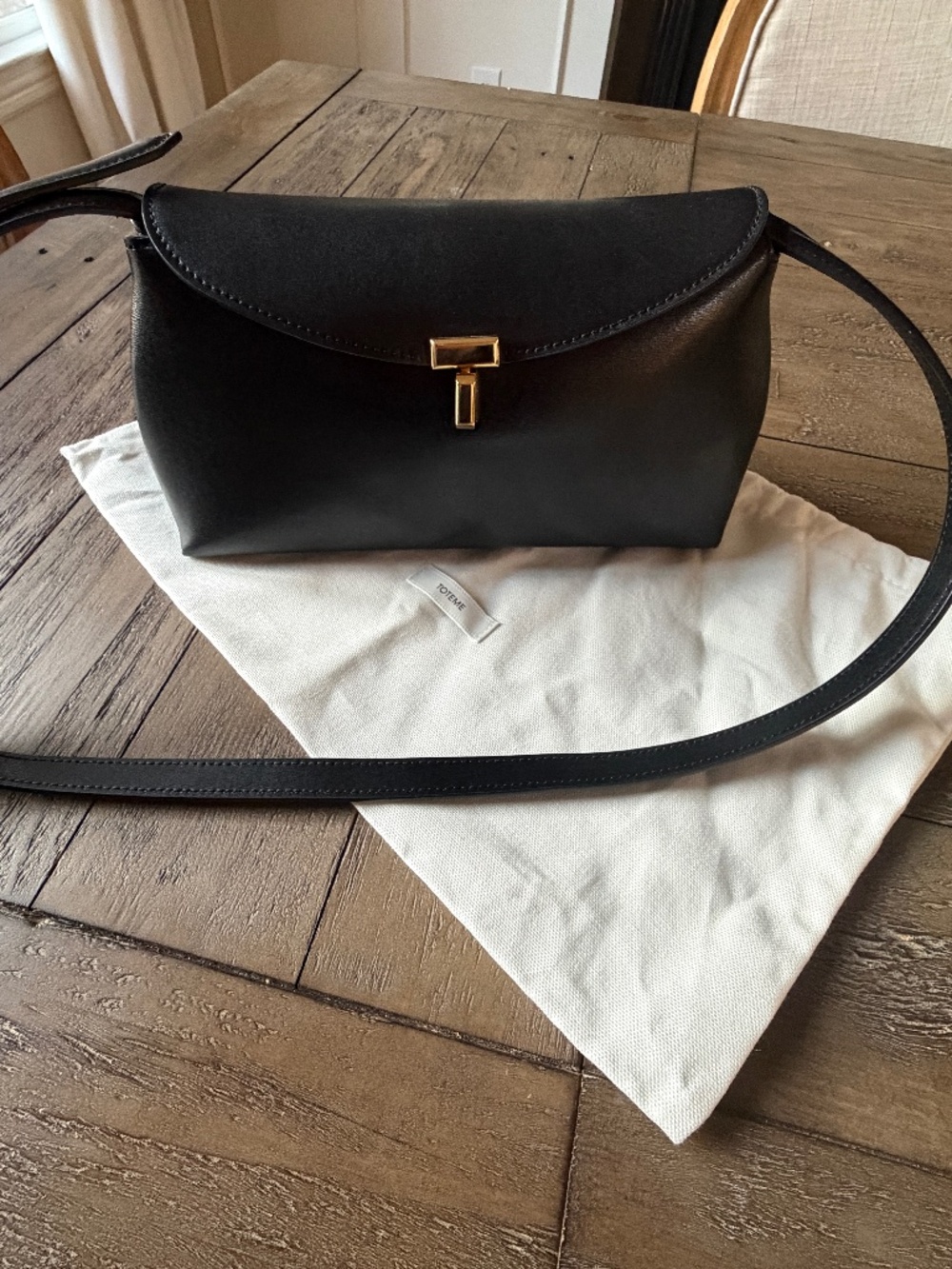 Toteme T-lock black clutch